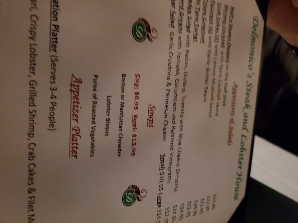 Menu layout for steak and lobster dishes.